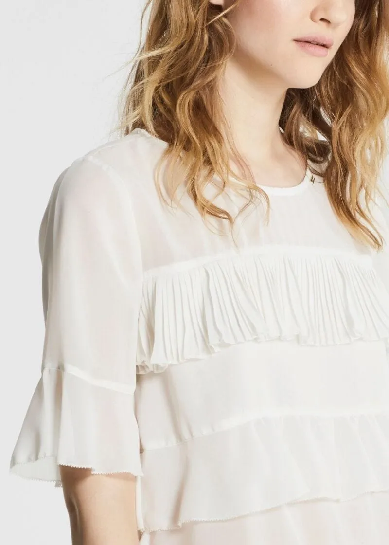 Blusa con balze
