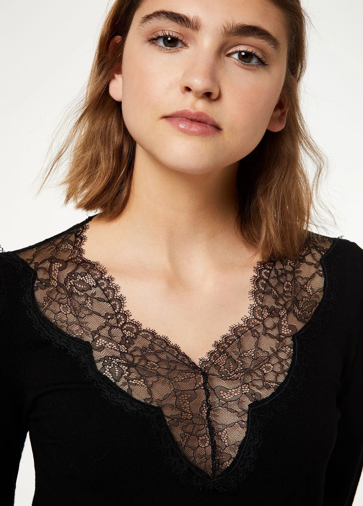 Body con pizzo