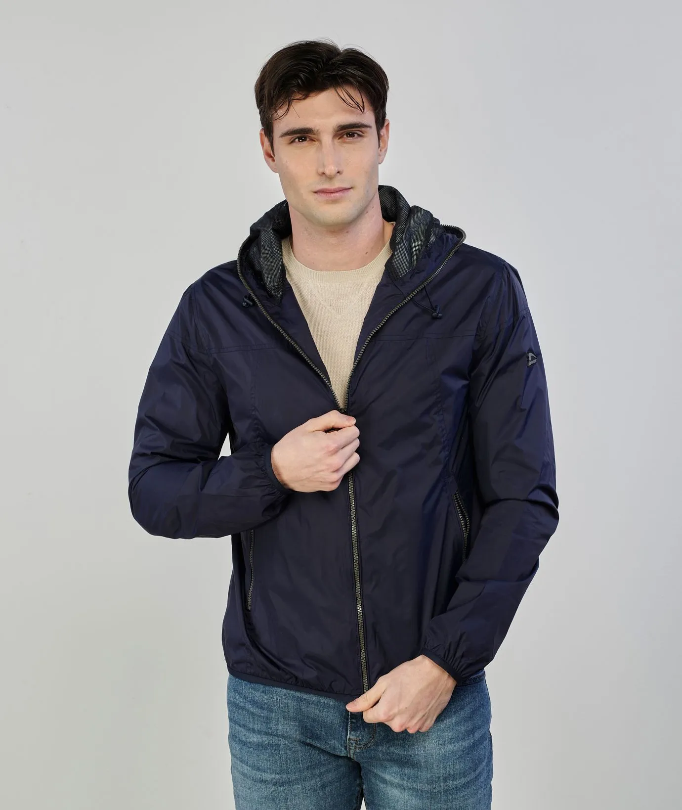 Giacca antivento blu con zip