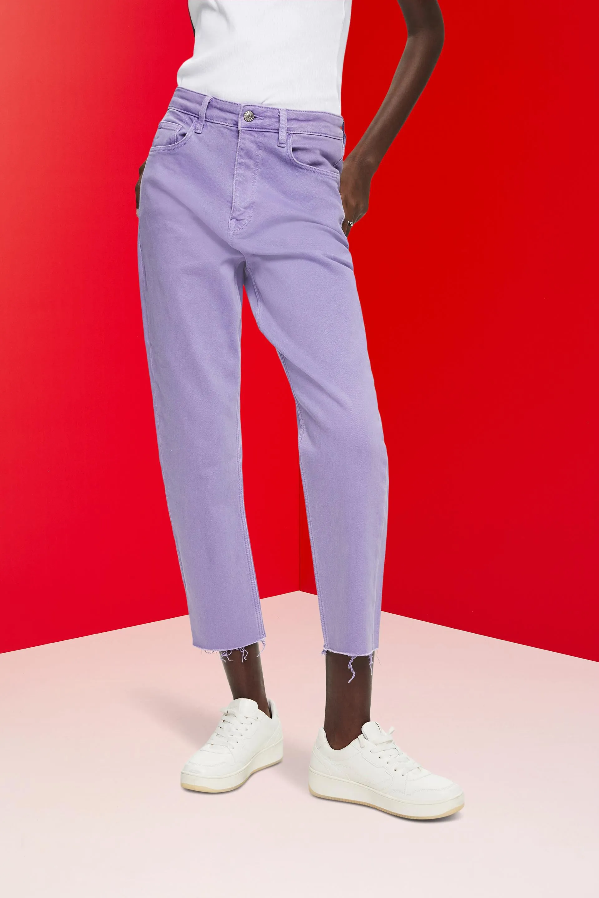 Pantaloni cropped con orlo con frange