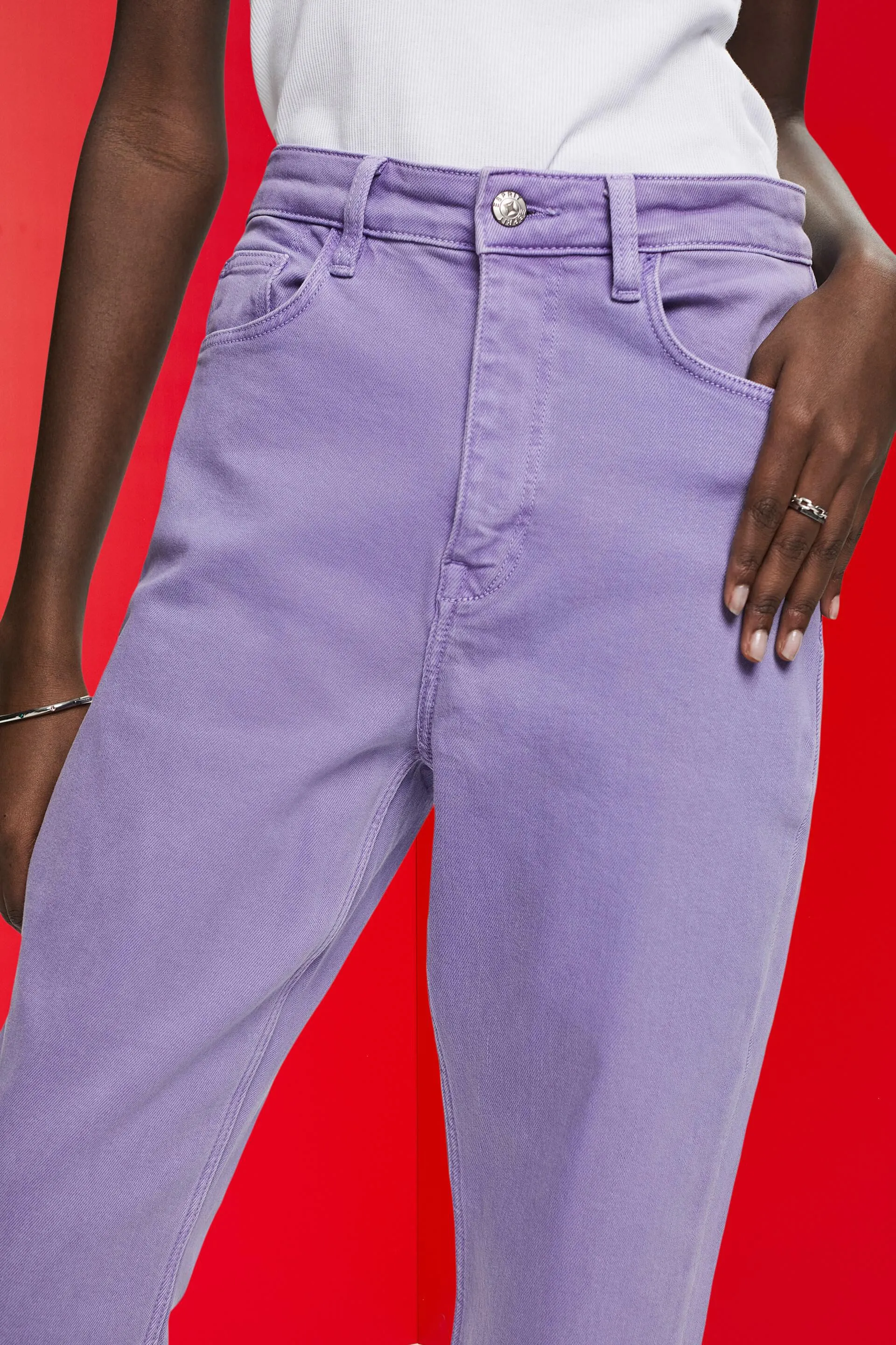 Pantaloni cropped con orlo con frange