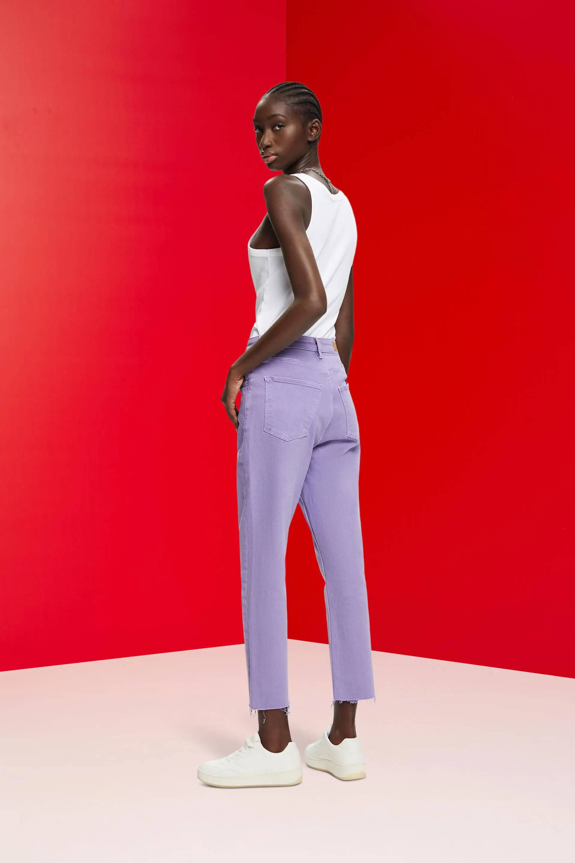 Pantaloni cropped con orlo con frange